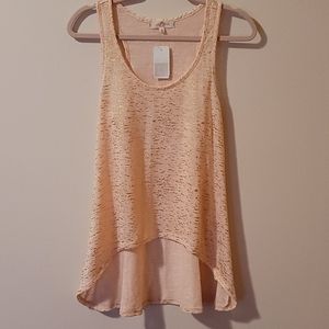 Almost Famous hi-low knit tank top.